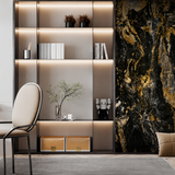 Deep black marble-effect surface with elegant gold veining creating a bold luxury feature wall