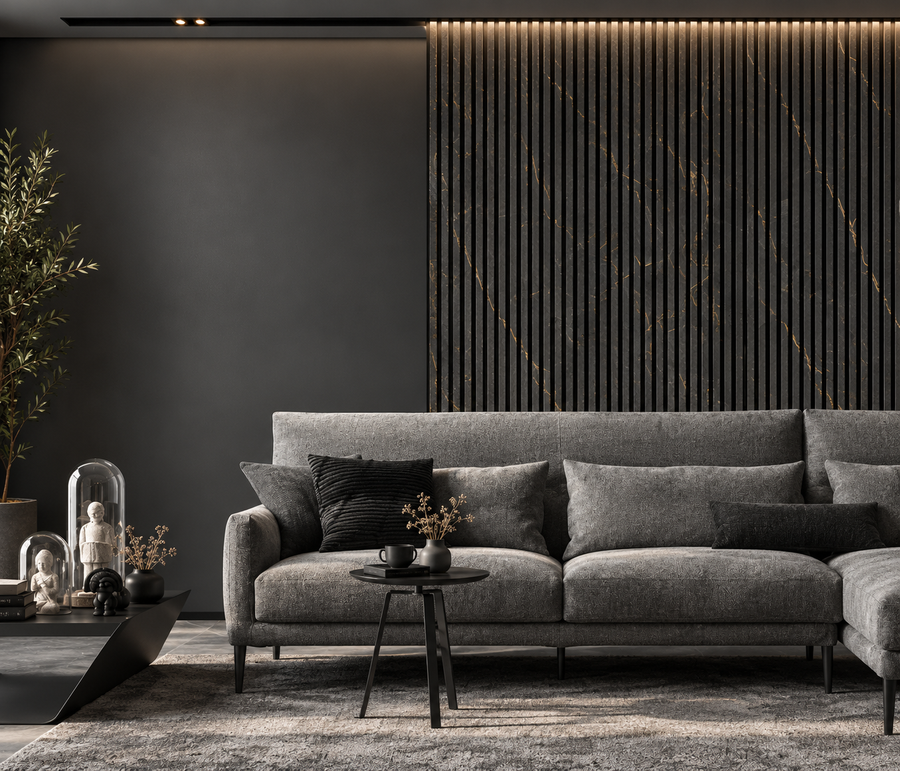 Sophisticated interior wall cladding combining rich black tones with metallic gold marble detailing