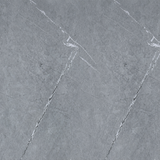 Close-up view revealing natural-looking grey patterns and subtle tonal variations across a smooth decorative surface