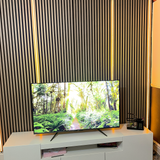 Warm natural wood grain finish creating a clean and contemporary feature wall for modern interiors