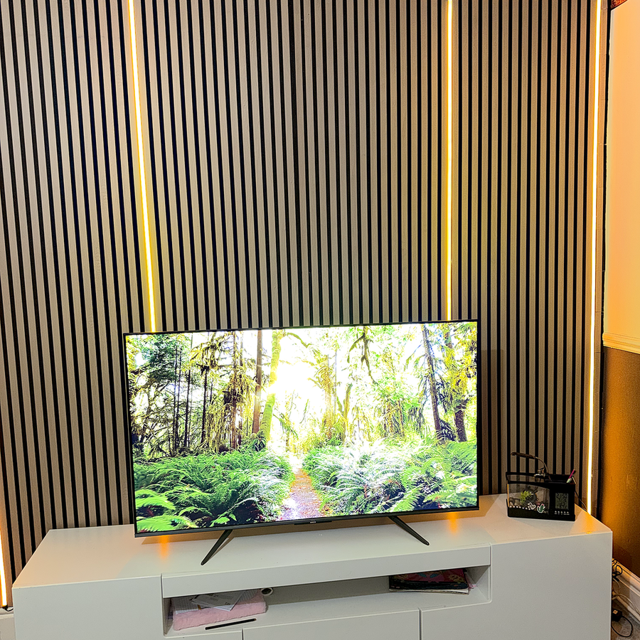 Warm natural wood grain finish creating a clean and contemporary feature wall for modern interiors