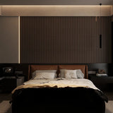 Contemporary interior featuring a 15 × 240 × 1.8cm dark grey seamless PVC wall panel for a bold architectural look